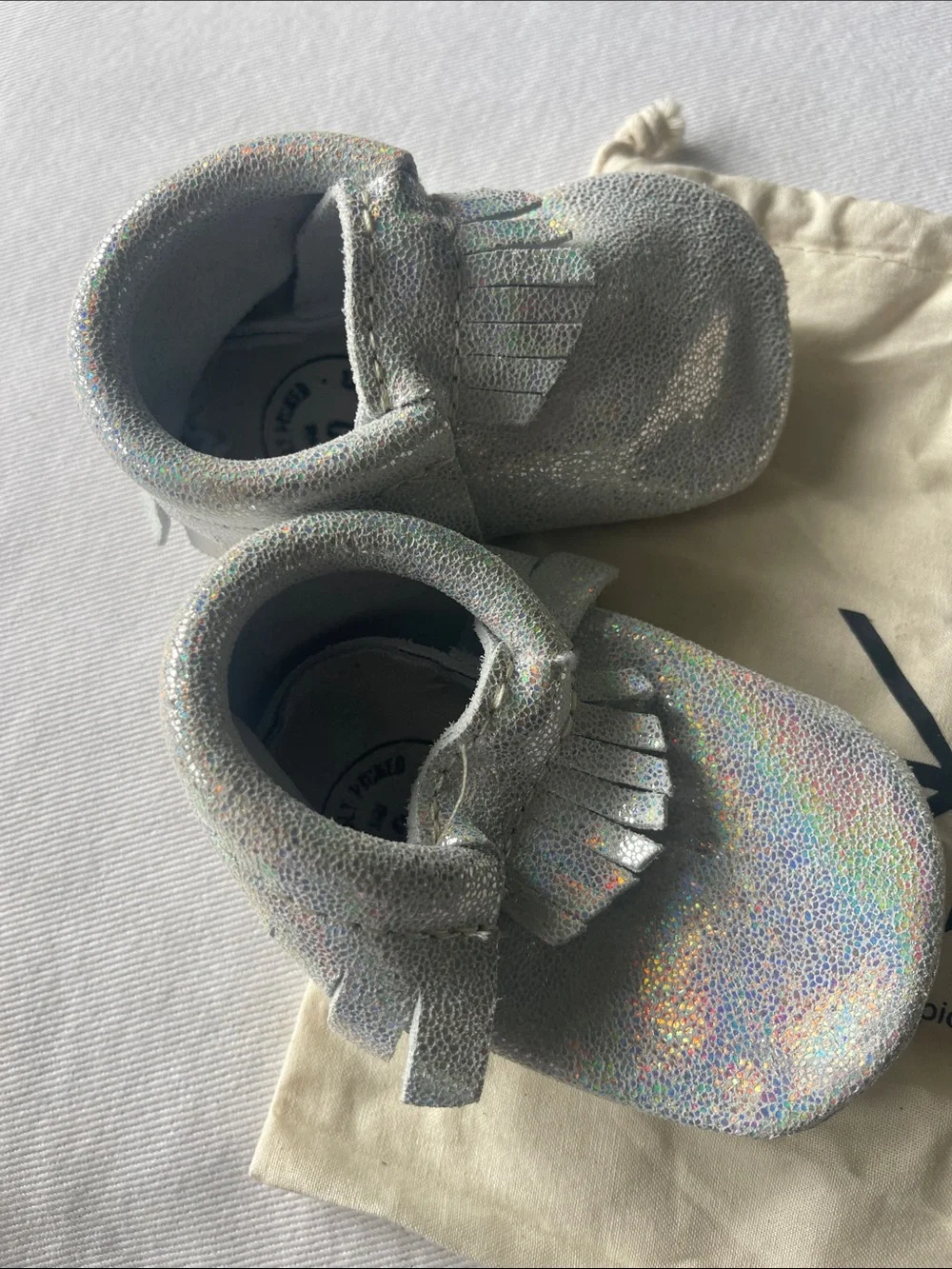 NWOT Freshly Picked Size 2 Silver Holographic Moccasins